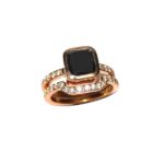 Black diamond rose gold engagement and wedding rings